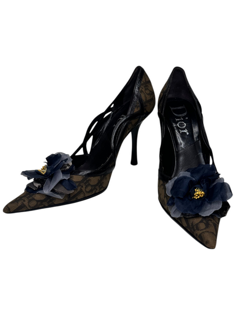 CHEZ SNOW BUNNY Dior Oblique brown canvas pointed-toe heels with navy blue floral embellishments and stiletto heels.