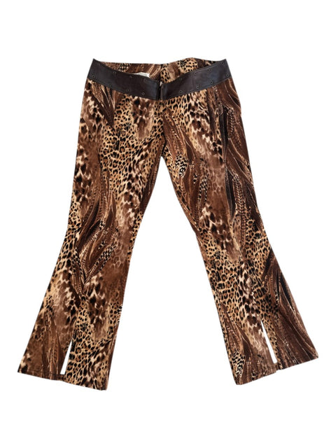 CHEZ SNOW BUNNY Avant animal print pants featuring a brown leopard pattern, dark brown waistband, and side slits.