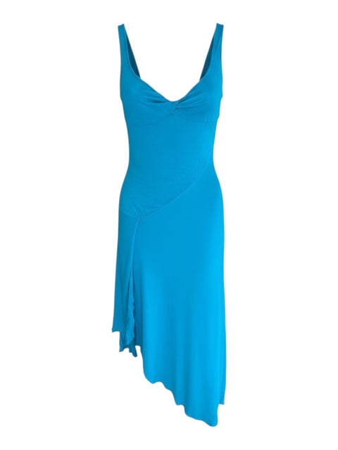 CHEZ SNOW BUNNY Versus blue maxi dress featuring a sleeveless bodice, twisted neckline, and an asymmetrical hemline.