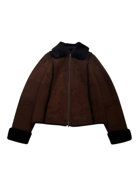 CHEZ SNOW BUNNY Sisely brown leather winter jacket with a black faux fur collar and cuffs and a front zip closure.