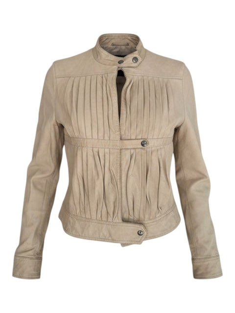 CHEZ SNOW BUNNY Mauro Grifoni beige leather jacket with pleated front detailing and a stand-up collar.
