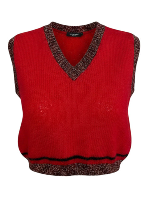 CHEZ SNOW BUNNY red knitted vest with a V-neck, featuring dark metallic trim on the neckline, armholes, and hem.