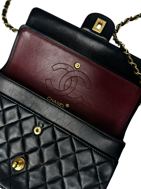 CHEZ SNOW BUNNY Chanel black lambskin 25cm double chain bag with quilted leather and burgundy interior flap