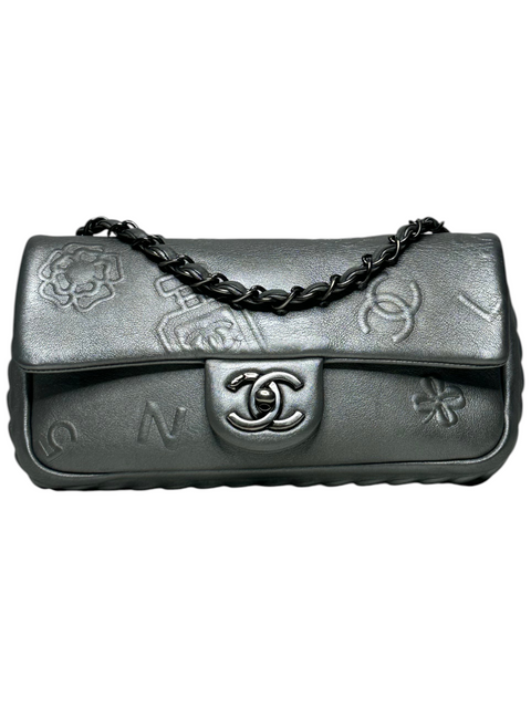 CHEZ SNOW BUNNY Chanel silver lambskin leather single flap bag with embossed logos and silver chain strap