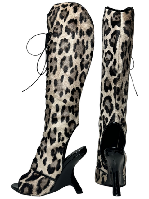 CHEZ SNOW BUNNY Tom Ford knee-high leopard print calf hair boots with lace-up front and sculptural black heels.