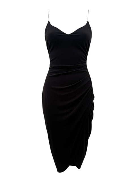 CHEZ SNOW BUNNY TchinTchin Paris black midi dress with spaghetti straps and asymmetrical draped skirt detail