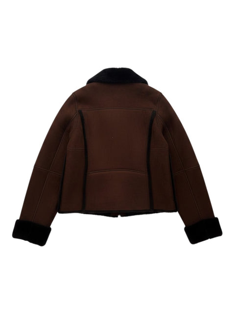 Back view of CHEZ SNOW BUNNY brown leather winter jacket with black faux fur collar and cuff trim