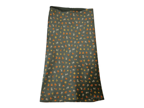 CHEZ SNOW BUNNY vintage green silk midi skirt featuring a delicate orange and white floral print pattern.